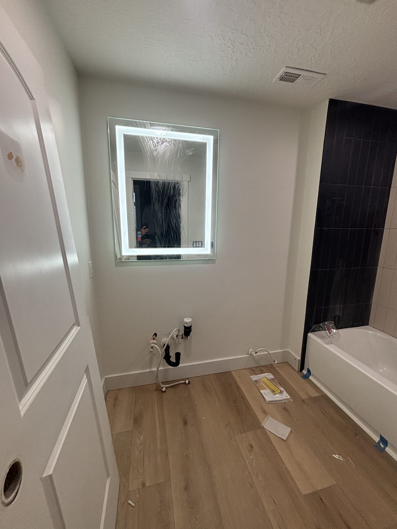 Bathroom remodel in progress by Handy Pro Utah