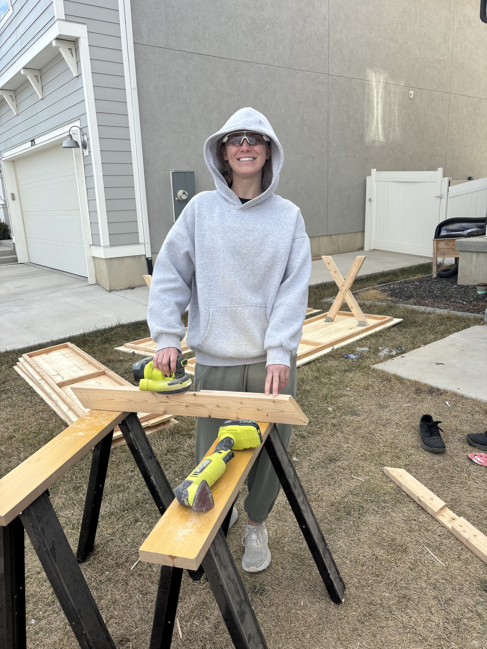 Handy Pro Utah team member sanding lumber on the job