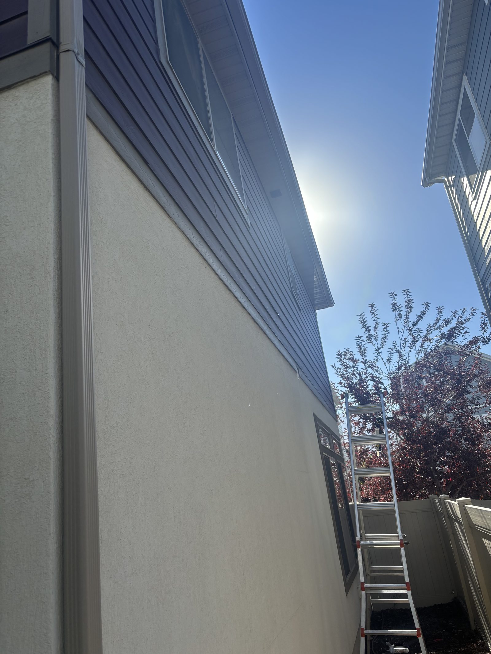 Exterior gutter and roofline access by Handy Pro Utah
